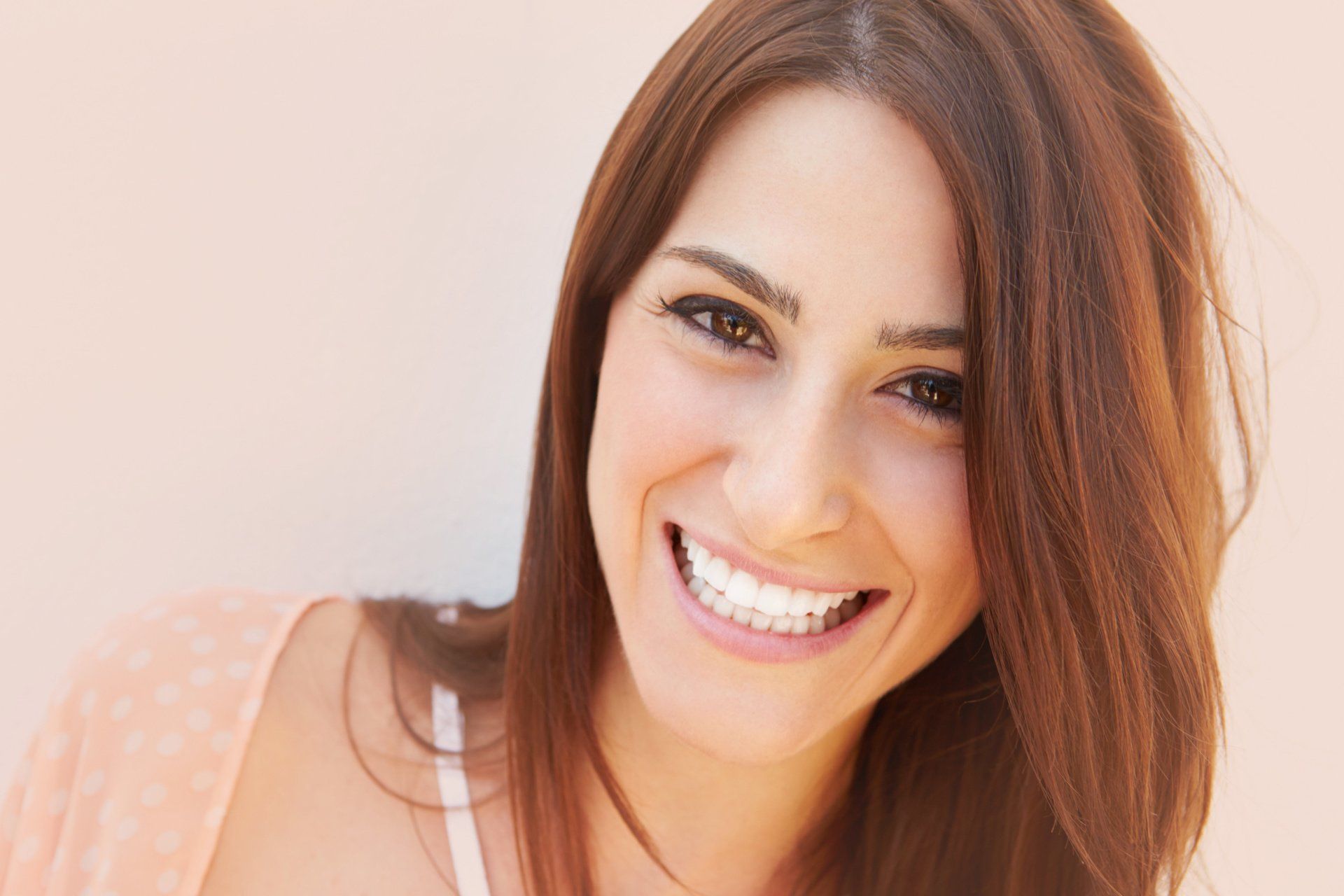 Confident smile after dental implant treatment